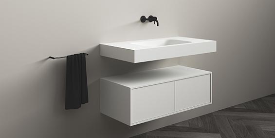 Badkamermeubelen 100 cm breed B DUTCH Siena. De Siena is vervaaridgd van Solid Surface Corian. Een zeer duurzaam hoogwaardig mat wit materiaal dat zeker niet vergeelt. Badkamermeubelen 100 cm breed B DUTCH Siena. De Siena is vervaaridgd van Solid Surface Corian. Een zeer duurzaam hoogwaardig mat wit materiaal dat zeker niet vergeelt. B DUTCH produceert badkamermeubelen op 100 cm breedte in diverse modellen, materialen en kleuren. B DUTCH produceert in haar fabriek in Cuijk een unieke design collectie badmeubelen. Diverse modellen en geheel naar wens van de klant samen te stellen. De badkamermeubel configurator kan daarvoor worden ingezet. Wastafelmeubelen, badmeubelen, 100 cm, wit, zwart, eiken hout, walnoten hout, met 1 wasbak, de mogelijkheden voor een eigen high end badkamermeubel 100 cm breed zijn eindeloos.